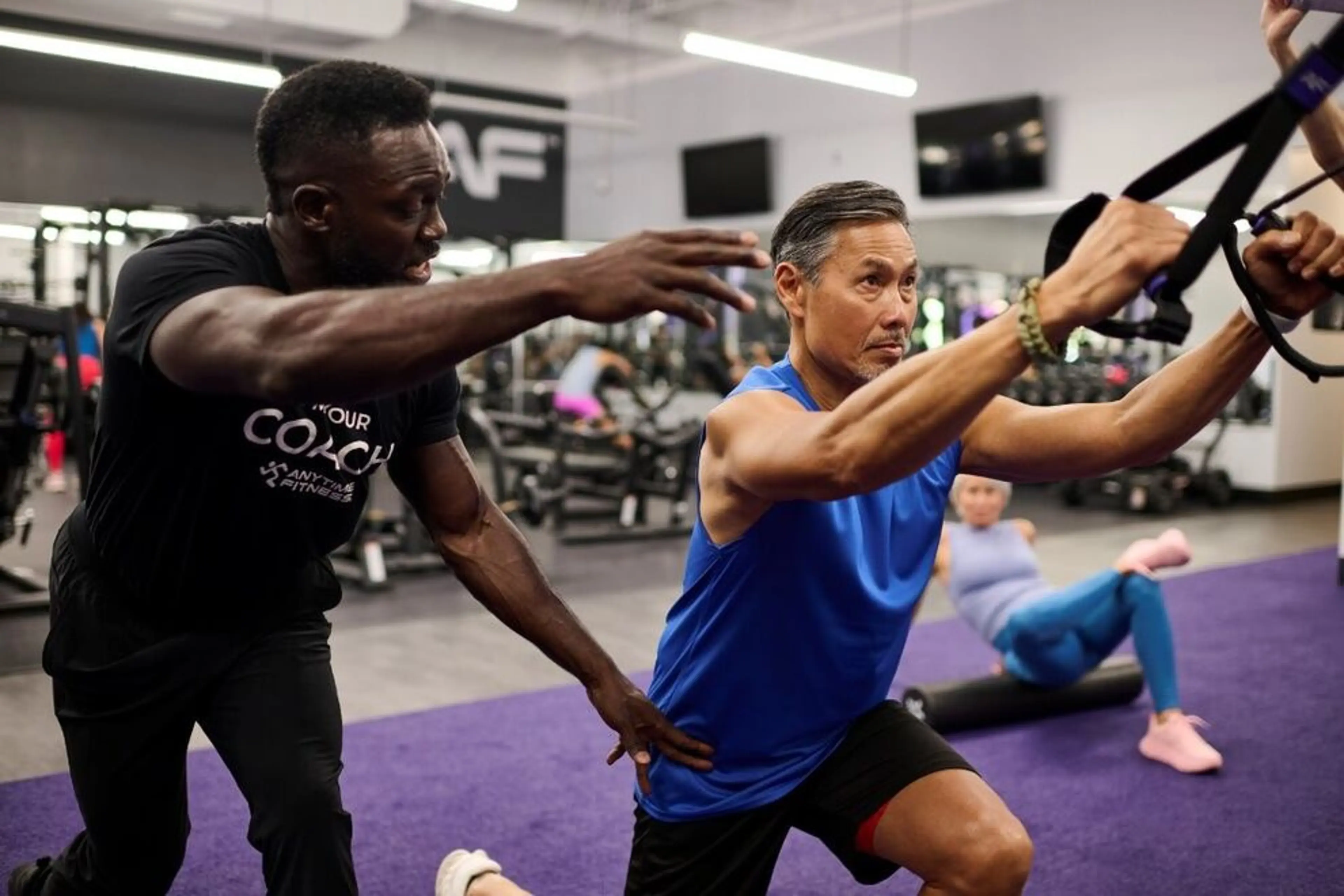 Gym member completing a strength training session